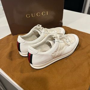 Gucci sneakers.